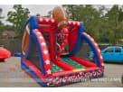 Football pass game bounce house rental in Dallas with dual slides, ideal for aspiring quarterbacks and all ages.