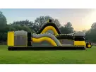 Toxic Adventure obstacle course rental in Austin with dual slides and tunnel sections — ideal for Buda parties.