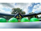Toxic Run obstacle course rental in Houston with green dome bumpers, ideal for kids' parties in Cypress.