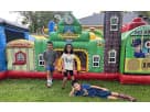 Train station obstacle course rental in Dallas with interactive clock tower, ideal for kids ages 3-12 at Grand Prairie parties.