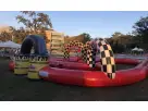 Hot air balloon bounce house rental in Dallas with checkered pattern design, perfect for Fort Worth birthday parties and events.