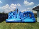 Perfect for Frisco summer parties, this dual lane water slide rental in Dallas features curved tube sections ideal for kids