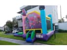 Trolls bounce house combo rental in Houston features vibrant pink, blue, green, and purple panels ideal for Pasadena parties.