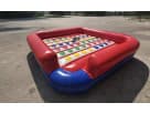 Inflatable Twister interactive game rental in Austin with classic colored ball grid pattern, ideal for Leander parties.