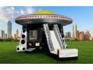 UFO Spaceship bounce house rental in Austin with dual slides, ideal for parties with kids ages 3 and up in Georgetown.