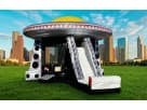 Renta de brincolín UFO Spaceship con tobogán para niños de 3+ años disponible en Houston — perfecto para eventos en Conroe.
