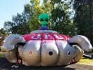 Perfect for Spring birthday parties, this alien UFO laser tag rental in Houston features interactive gameplay for kids ages 5-12.