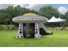 Renta de castillo inflable UFO con tobogán en Katy, ideal para fiestas en Houston con diseño amarillo.