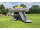 UFO Spaceship bounce house rental in Austin with slide, holds up to 6 kids, perfect for Georgetown backyard parties and events.