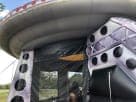 Brincolín temático de nave espacial UFO con tobogán, ideal para renta en Houston — perfecto para eventos con hasta 6 niños