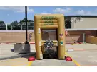 Yellow Cash Vault money machine rental in Pasadena with interactive tunnel entrance, ideal for Houston parties.