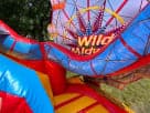 Perfect for Dallas toddler birthday parties, this colorful amusement park bounce house rental features safe, age-appropriate fun