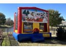 13x13 Christmas bounce house rental in Dallas with Santa and reindeer graphics, perfect for Arlington holiday parties.