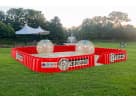 Red and white Zorb Wars bumper car rental in Dallas with numbered inflatable cars, perfect for interactive party entertainment