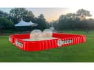 Perfect for Austin interactive rentals, red Zorb Wars arena with transparent bumper balls creates the ultimate group activity