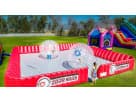 Red and white Zorb Wars inflatable arena rental in Dallas perfect for interactive party activities with capacity for multiple