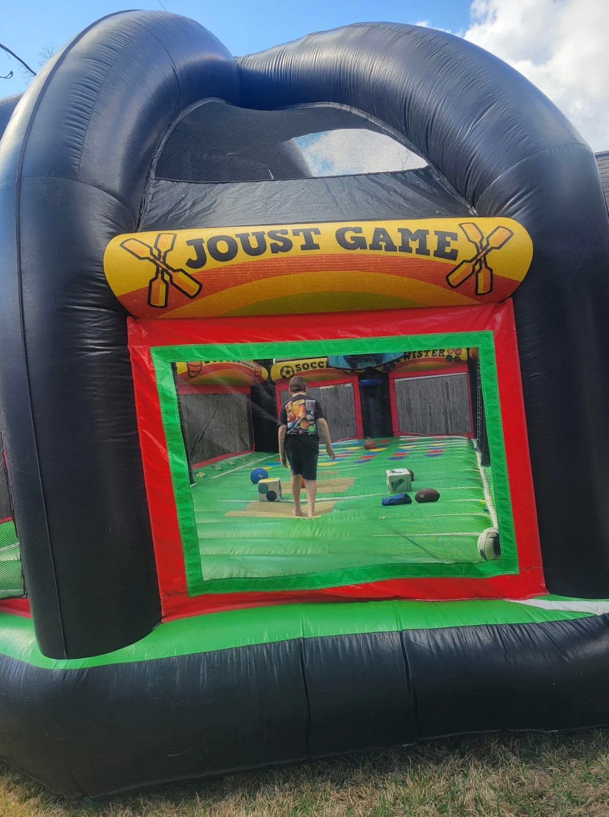 Google Review customer pic submission kids playing in the All in one sports bounce house.