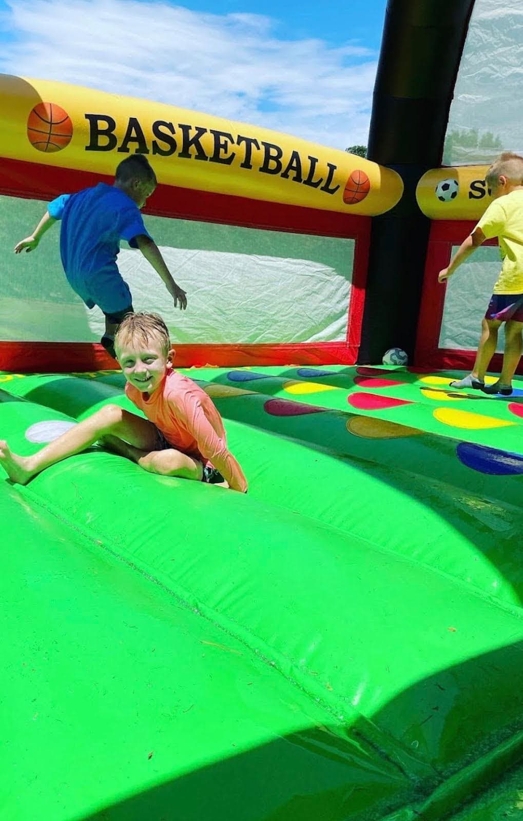 Kids playing in All in One Sports bounce house Google Review Repost